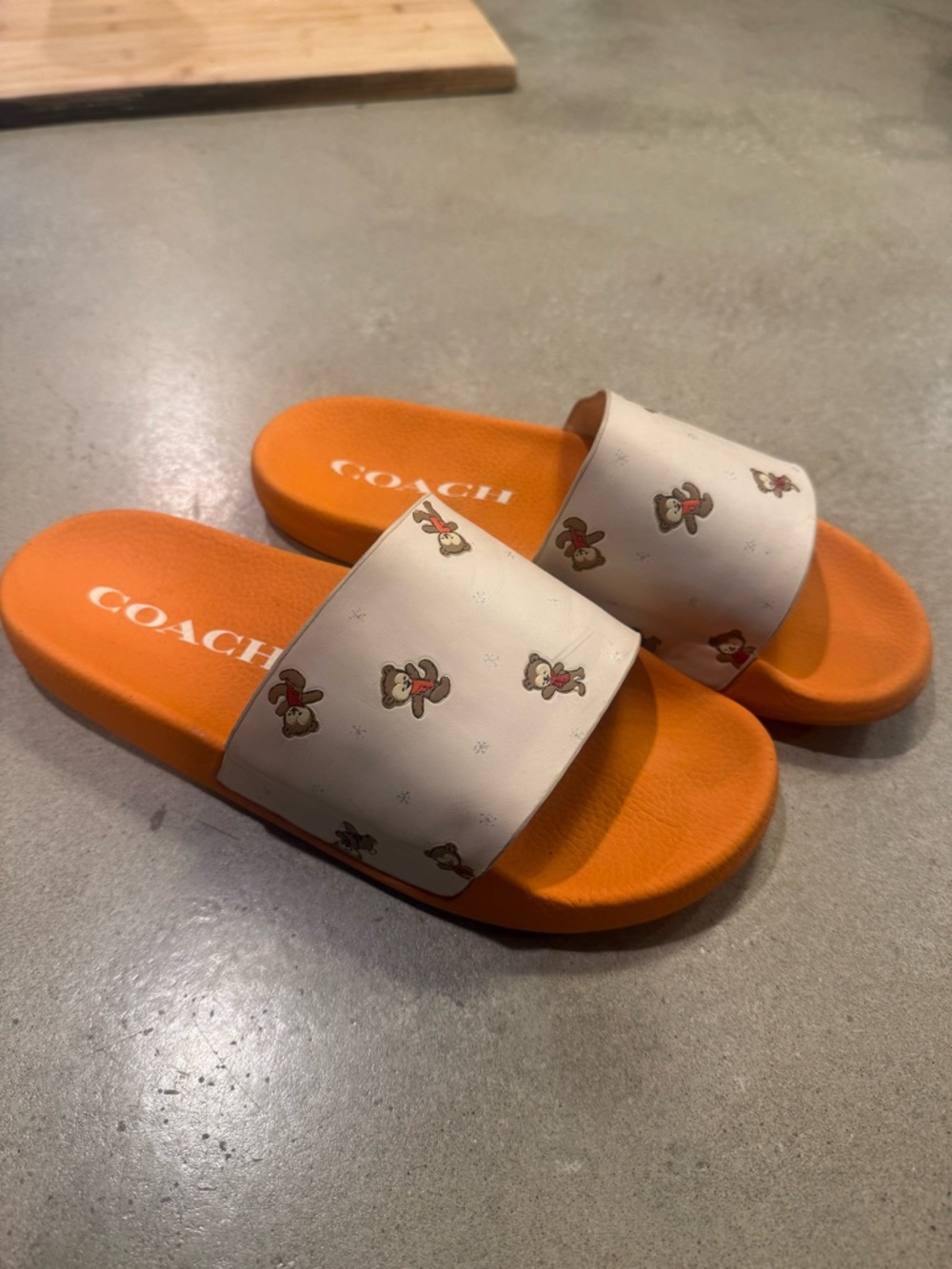Coach Orange Slide Sandals with White Printed Strap